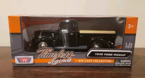 Black 1940 Ford pickup truck die-cast model in retail box, 1:24 scale