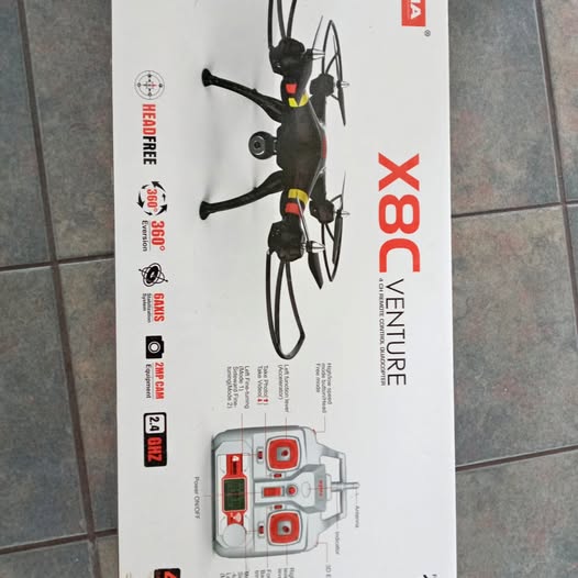 Drone quadcopter camera package with pictured quadcopter and controller illustration