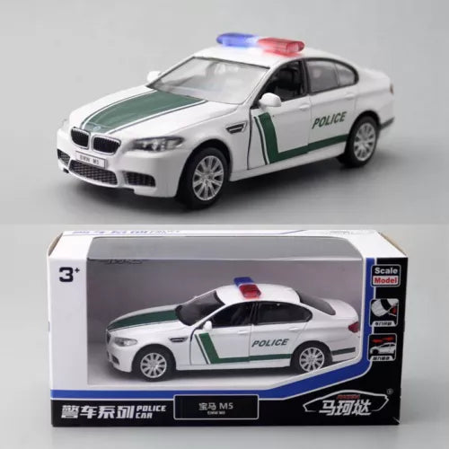 Police car diecast scale model toy in box, white with green stripe and red/blue light bar