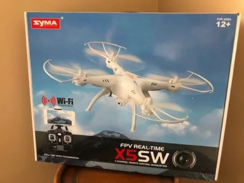 White quadcopter drone with front camera and four propellers