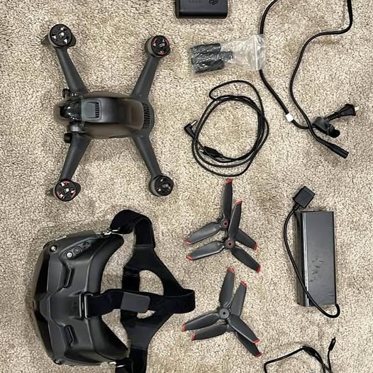 FPV drone and goggles set, dark gray with head strap and cables