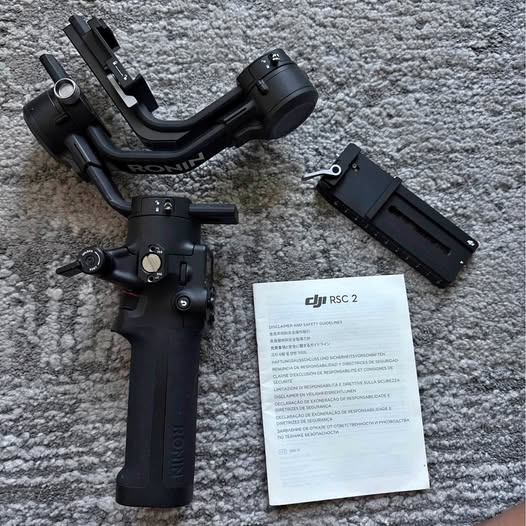 DJI Ronin SC2 gimbal stabilizer with handle and camera mount, black