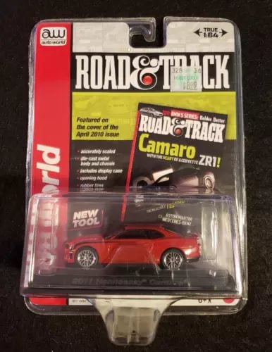 Red 1/64 scale Camaro diecast car in clear blister Road & Track package