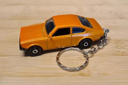 Diecast model car keyring, orange 1975 Opel Kadett with chrome chain