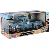 Weathered blue 1955 GMC pickup diecast model car in display box