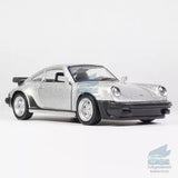 Silver 1:36 diecast 1978 Porsche 911 Turbo model car, front 3/4 view