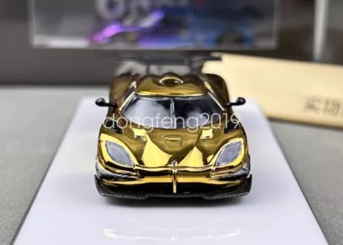 Gold electroplated sports car diecast model toy with front grille and headlights