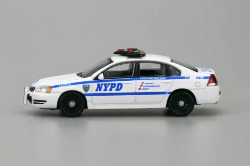 1:64 diecast police car model, white NYPD patrol sedan with blue stripes and NYPD logo