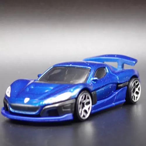 RIMAC die-cast supercar model car, blue, front three-quarter view, 1:64 scale