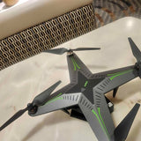 NV Drone with four propellers, dark gray body and neon green accents
