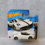 White Hot Wheels diecast roadster on blue blister card, front and side views