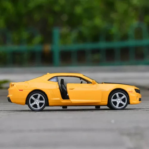 Yellow 2-door alloy diecast car model with open driver door