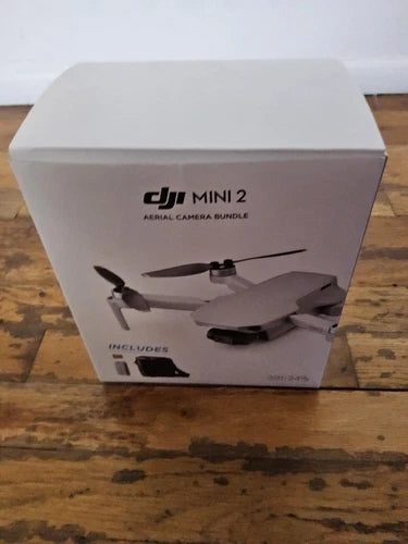 DJI Mini 2 aerial camera bundle box with drone illustration