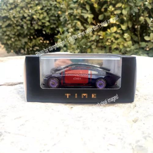 Diecast car model in clear display box, dark red sports car with Time branding