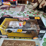Diecast stock car replica in retail box, yellow '03' race car, 1:24 scale