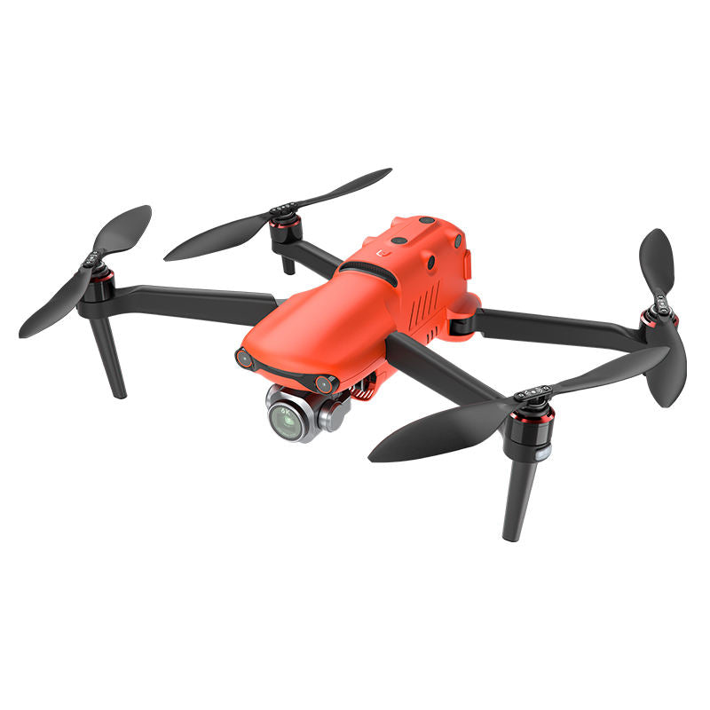 Orange quadcopter drone with front camera and four foldable propellers