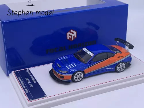 Diecast model car: blue Nissan Silvia S15 with orange side stripe and rear spoiler