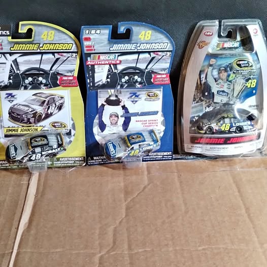 NASCAR diecast car blister pack, blue-and-white #48 Jimmy Johnson design