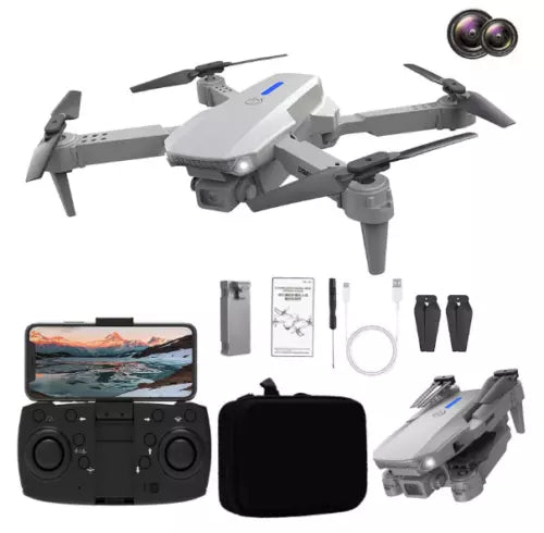 White foldable quadcopter drone with controller and spare accessories, compact travel set