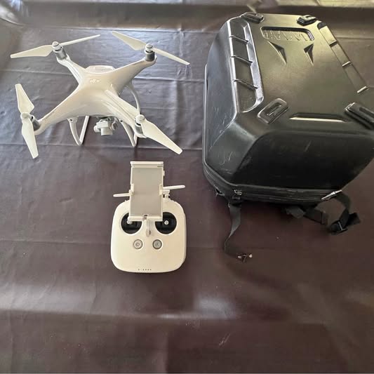 DJI Phantom 4 drone with controller and protective case