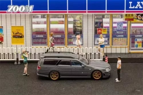 Die-cast wagon model car, cement gray with black windows and gold wheels