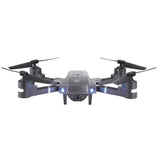 Foldable video drone with four propellers and front camera, dark gray body