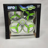 Interactive LED stunt drone box with green quad propellers and UFO1 branding