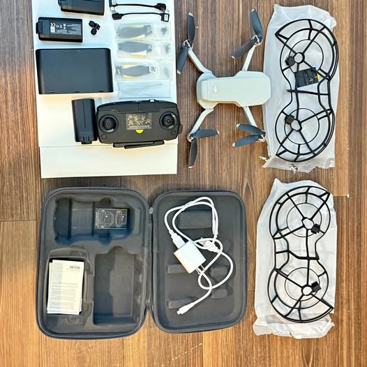 DJI Mavic Mini fly combo drone accessories with controller, propellers, and cases