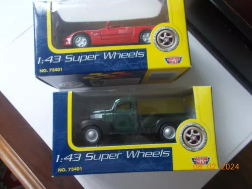 Two 1:43 Super Wheels diecast cars in retail boxes, red Corvette and dark pickup.