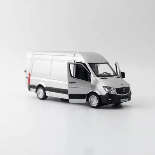 White and black delivery van diecast model toy in front three-quarter view