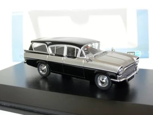 Classic diecast model car, dark two-tone sedan with chrome grille and headlights