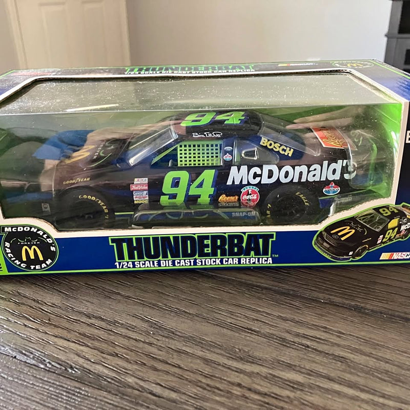 1:24 die-cast stock car replica, green and black #94 Thunderbat
