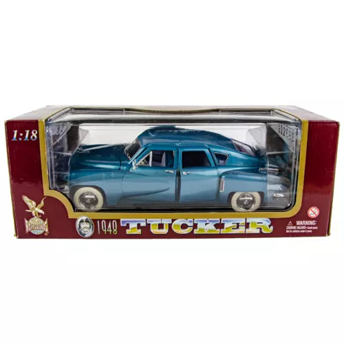 1:18 diecast model car of a teal Tucker Torpedo in display box