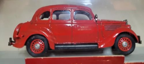 Red diecast emergency vehicle model car, 1:43 scale