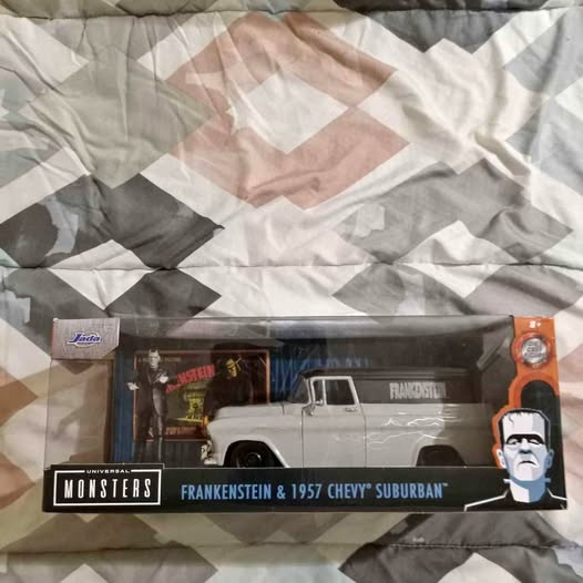 1:24 diecast panel truck in box, white pickup with monster graphics and Frankenstein face