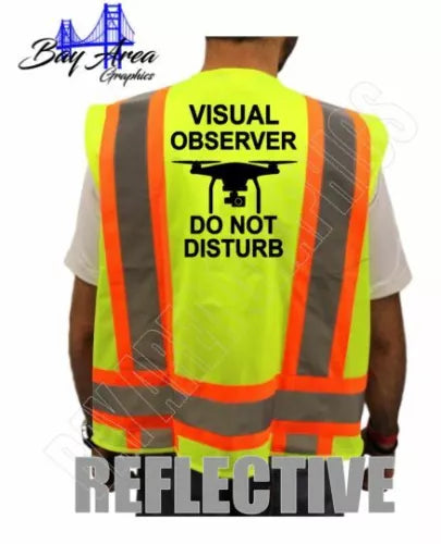 Hi-visibility yellow safety vest with orange reflective stripes and back text