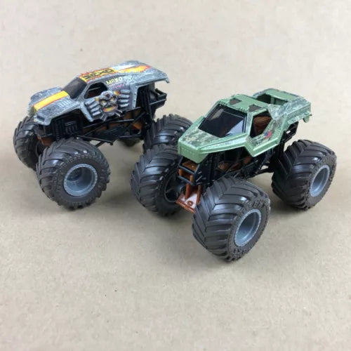 1:64 diecast monster trucks, silver and green with oversized tread tires