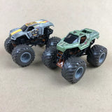 1:64 diecast monster trucks, silver and green with oversized tread tires