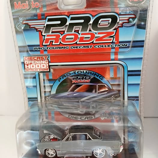 1965 Pontiac GTO diecast model car in blister packaging, gray with orange stripes