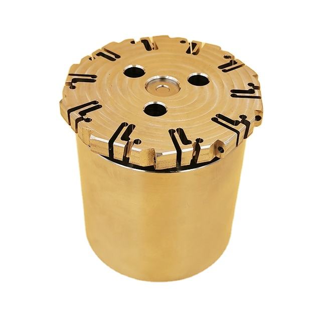 Gold anodized metal cylindrical part with CNC-cut slots and three mounting holes