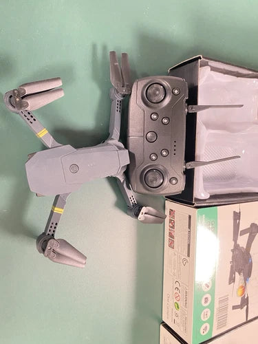 Quadcopter drone with HD camera, four propellers, and front body detail