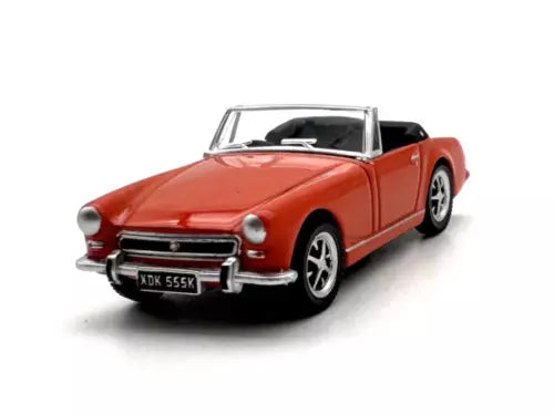 Red convertible diecast sports car with black interior and front bumper details