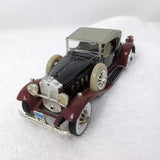 Burgundy and black 1930 Packard LeBaron diecast model car with open doors
