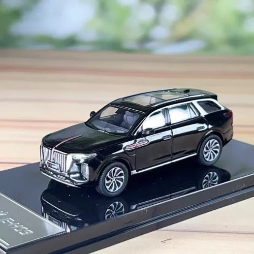 Black diecast car model with chrome grille and detailed wheels on display base
