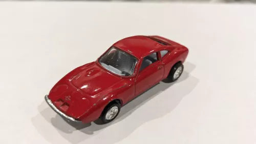 Opel GT diecast sports car model in red with black windows