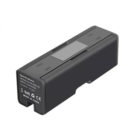 Black 4-in-1 drone battery charger hub with side label and charging connector bay