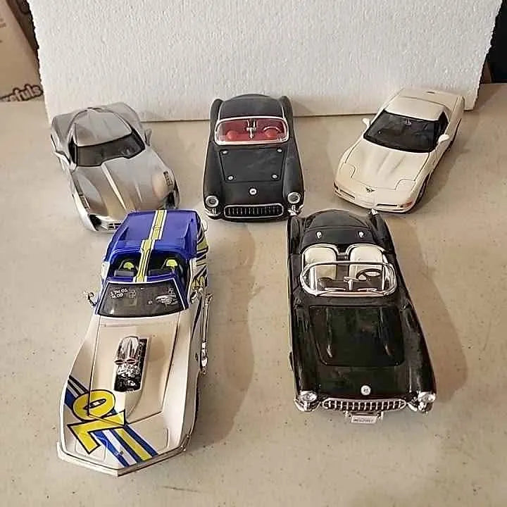 Set of five 1:24 diecast Corvette cars, five model cars viewed from above