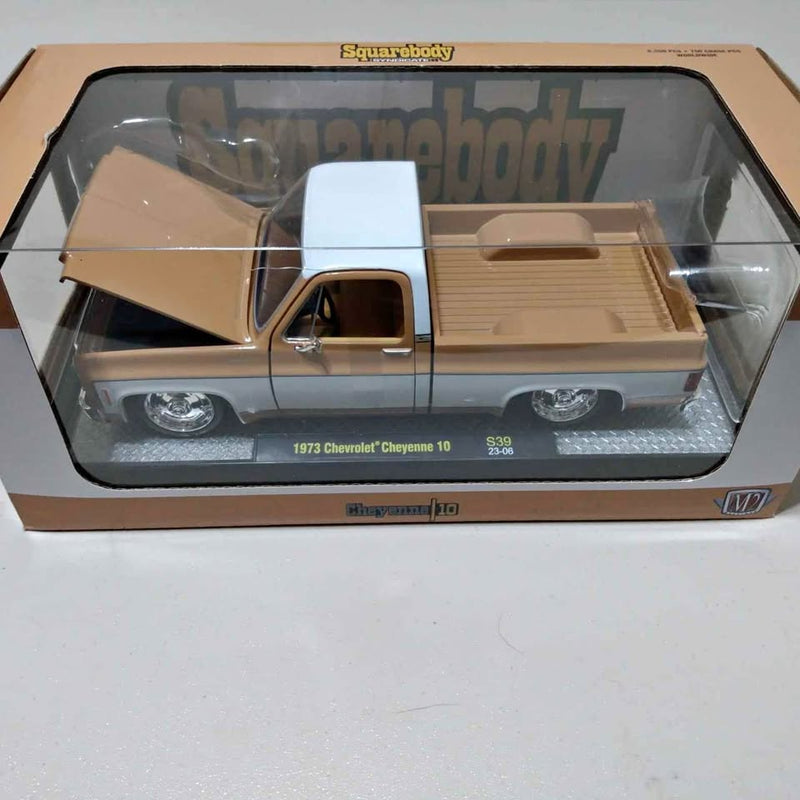 1:24 scale diecast Chevy squarebody pickup truck, tan and white, in display box