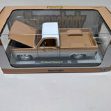 1:24 scale diecast Chevy squarebody pickup truck, tan and white, in display box