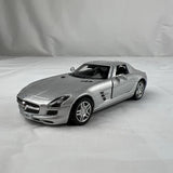 Gray diecast model toy car, 1:36 scale, front three-quarter view